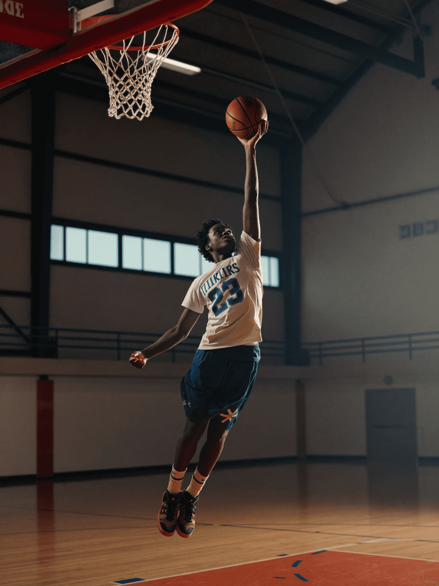 A young basketball player shooting during a training session at The Shot Project in Perth